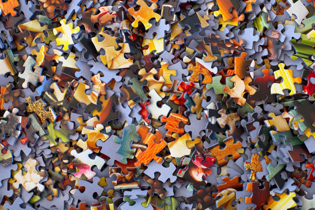 colorful puzzle pieces scrambled together
